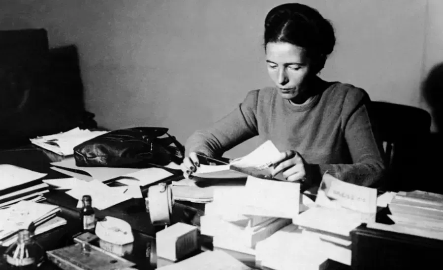 Simone de beauvoir writing a book